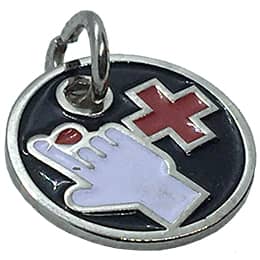 This circular metal charm depicts a red cross next to a hand with a blood drop coming out of a finger.