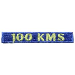 The words 100 KMS is stitched in yellow on a dark blue background.