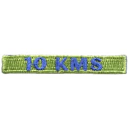 10 KMS are stitched in blue on a green patch.