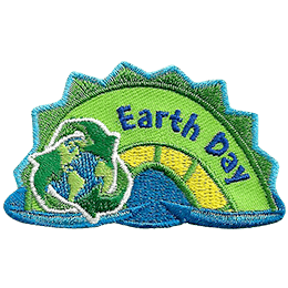 The middle hump of a green and yellow sea serpent. The words Earth Day are on the hump, and a globe is at the bottom left.