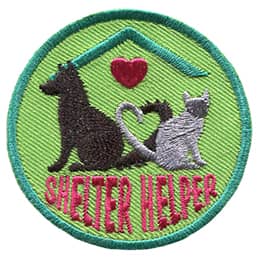 a dog and cat sit back to back with a heart and roof above them, below the words shelter helper