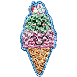 Two scoops of ice cream in a cone with smiling faces. 